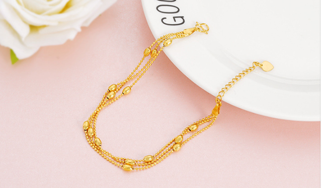 Gold-Plated Three-Wire Turn & Transport Bracelet For Women