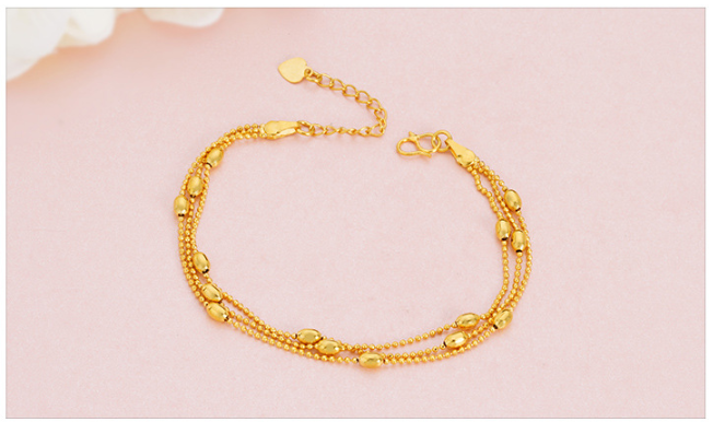 Gold-Plated Three-Wire Turn & Transport Bracelet For Women