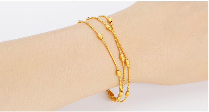 Gold-Plated Three-Wire Turn & Transport Bracelet For Women