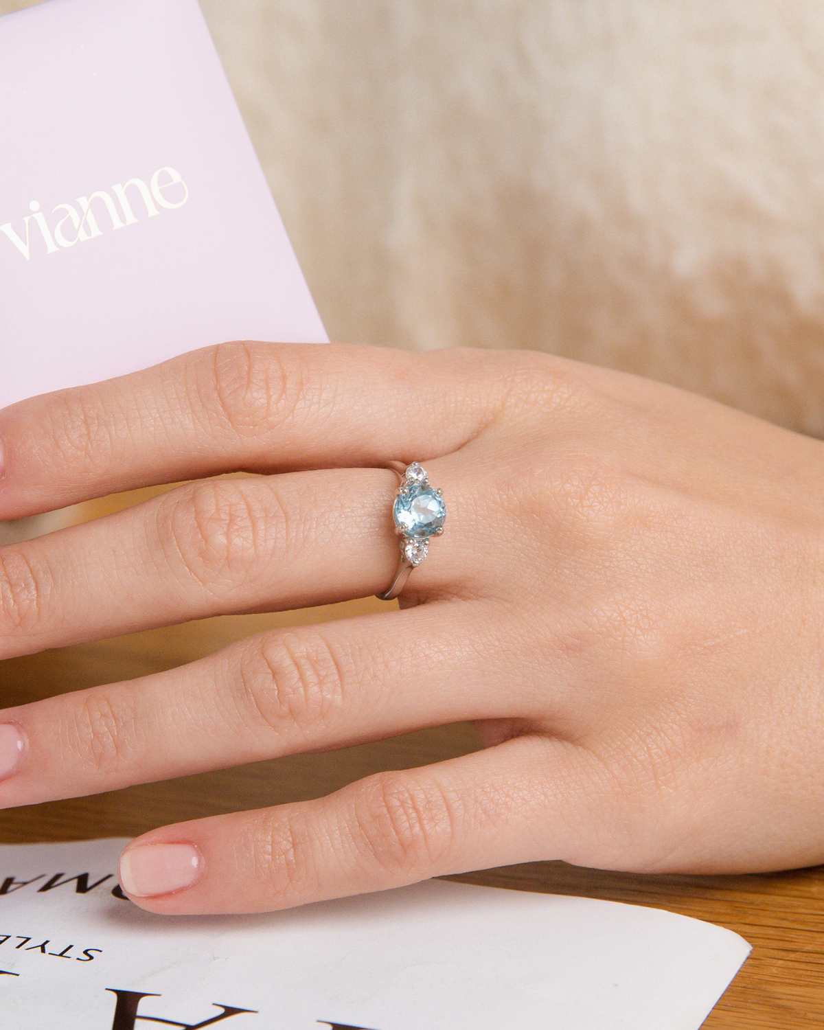 Blue Topaz Three Stone Ring in Sterling Silver