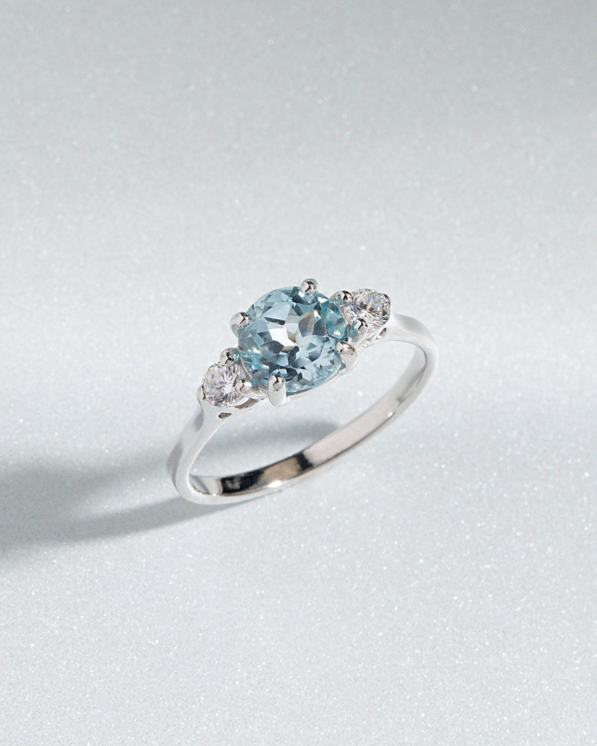 Blue Topaz Three Stone Ring in Sterling Silver