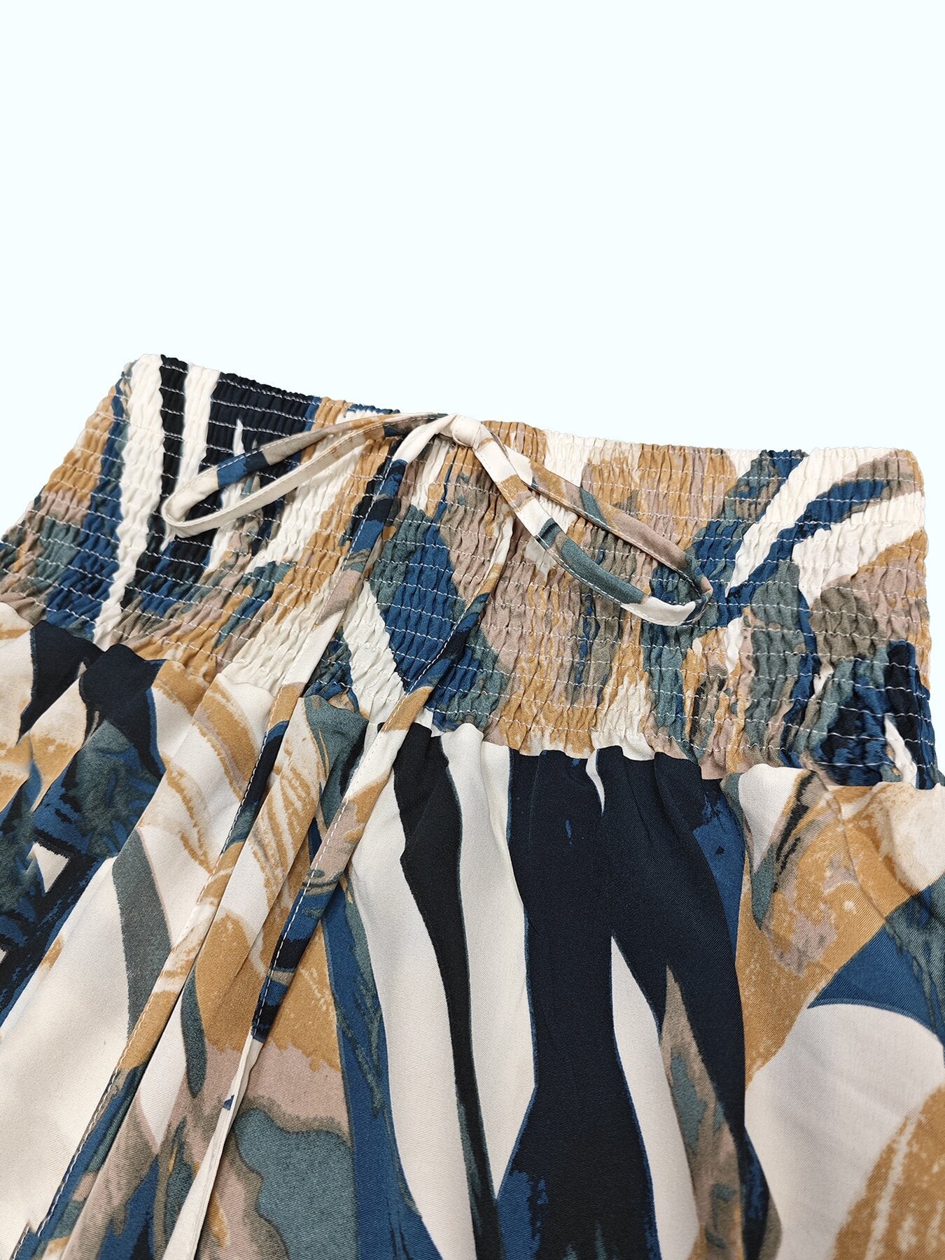 Irregular Abstract Print Skirt With A Casual, Fitted Waist And Tie-up Design Perfect For A Laid-back Vacation Look