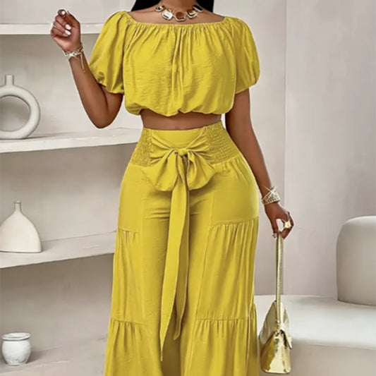High-waisted Solid-color Flared Pants With Tie Detailing And A Flowing Drape