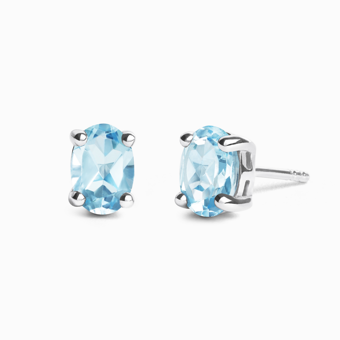 Blue Topaz Oval Stud Earrings in Sterling Silver
