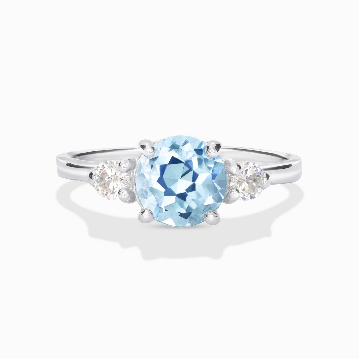 Blue Topaz Three Stone Ring in Sterling Silver