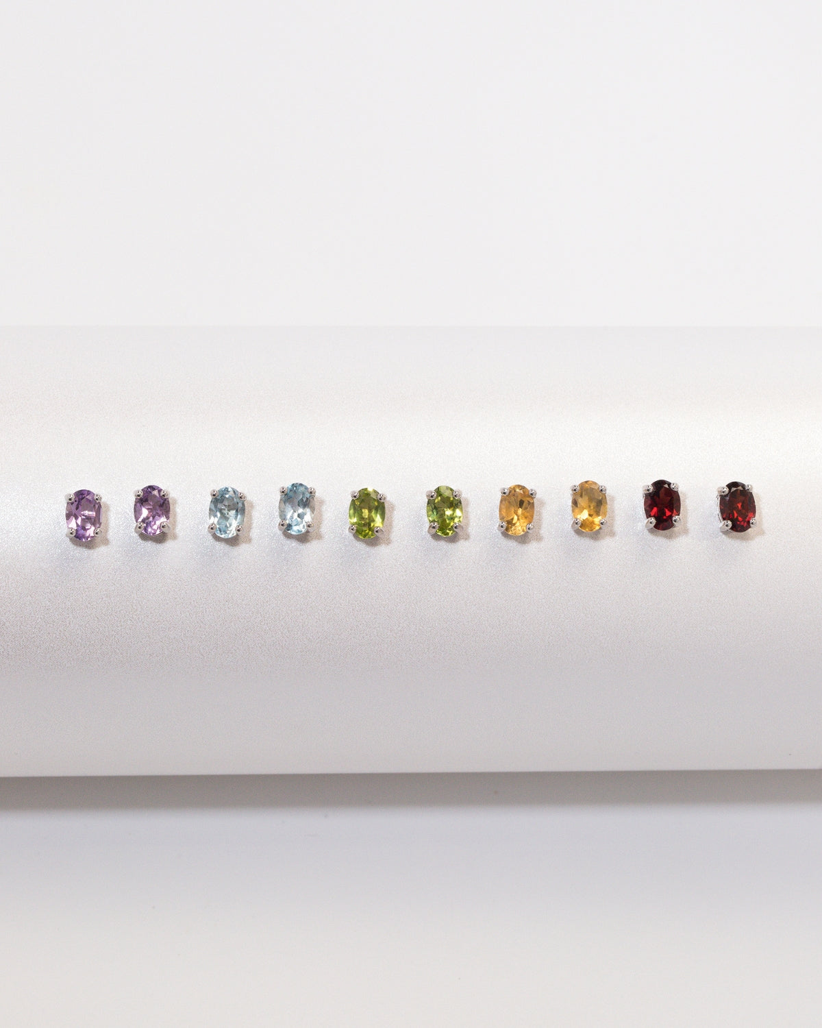 Blue Topaz Oval Stud Earrings in Sterling Silver